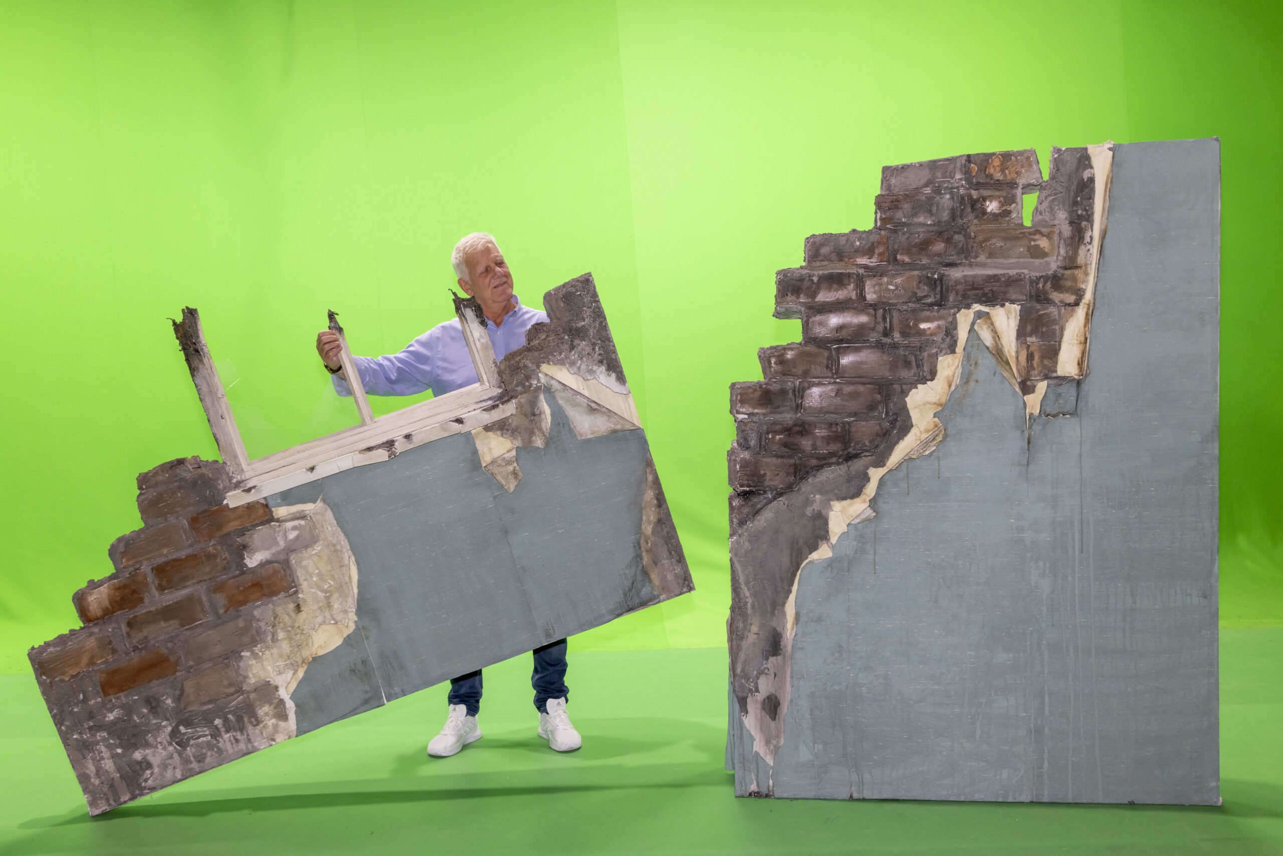 Tom Henderson behind a film set made by VECTAR sets