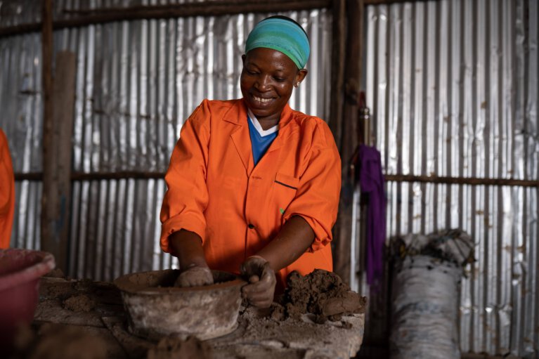 Employee working at USAFI Green Energy making food