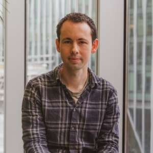 Man sitting and smiling