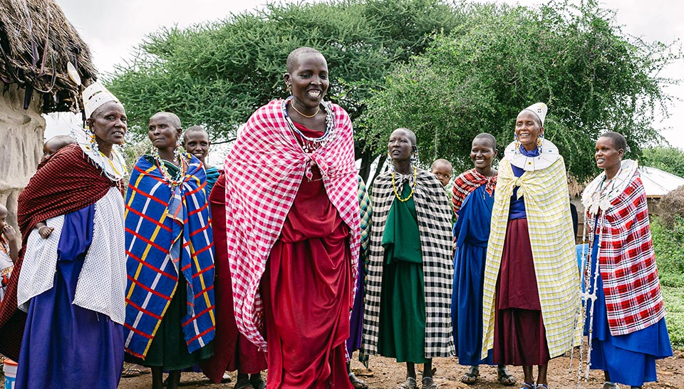 Ujamaa Community Resource Team dance with Indigenous communities in rural Tanzania.