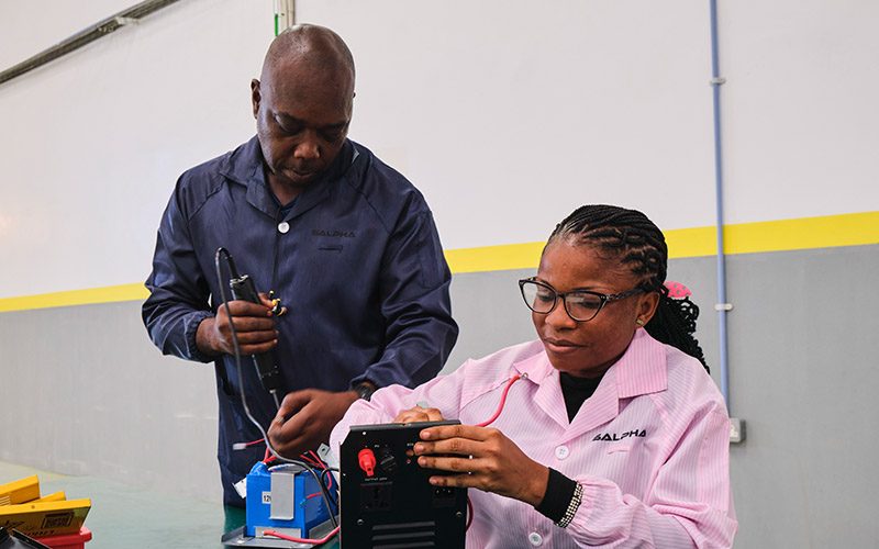 Staff at Salpha Energy are manufacturing high-quality clean energy products which are sold on affordable pay-as-you go finance.