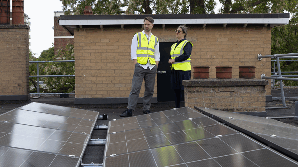 Reg Platt, CEO of Emergent and Cllr Sarah Young, Cabinet Member for Climate Change, Environment & Transport, Hackney Council, on the roof of Devonshire Hall, Hackney, East London.